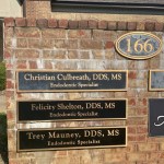 Official office plaque with practice information