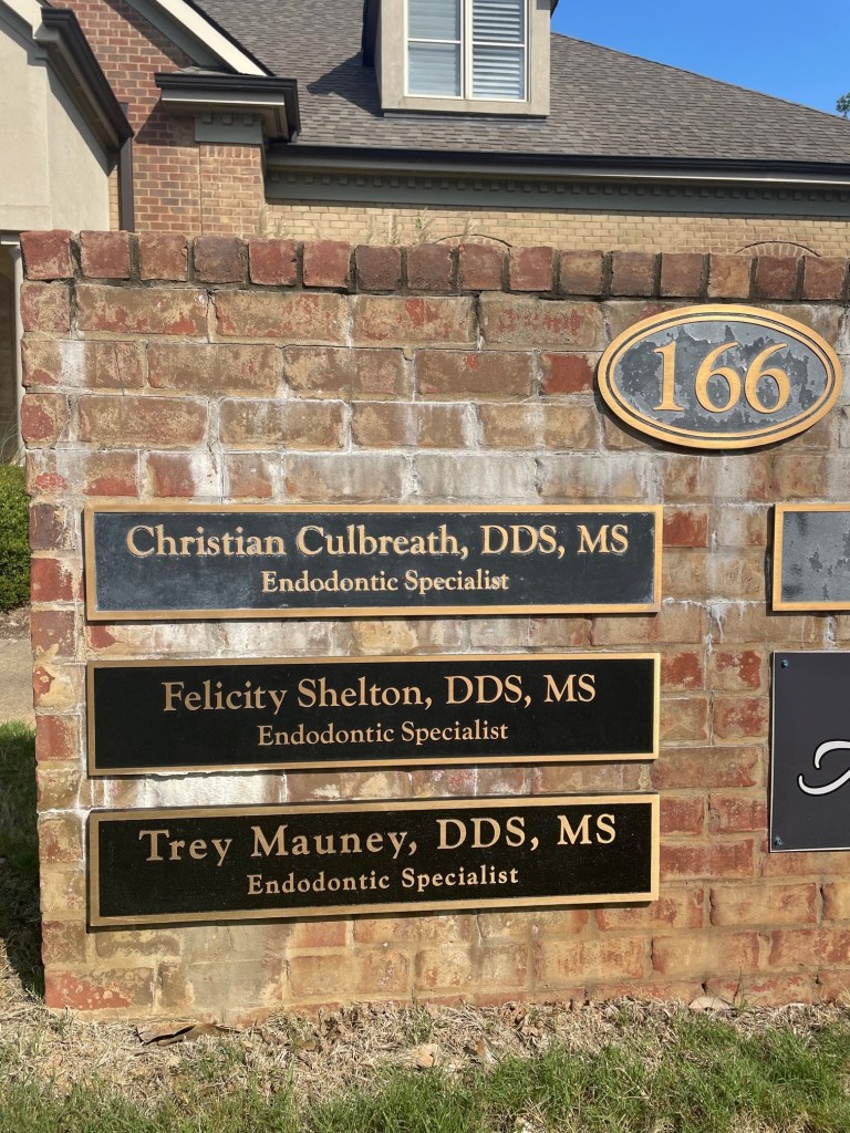 Official office plaque with practice information