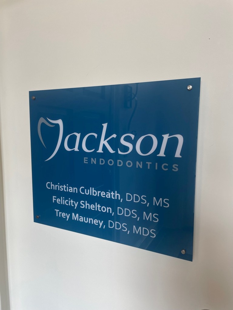 Front entrance sign to building